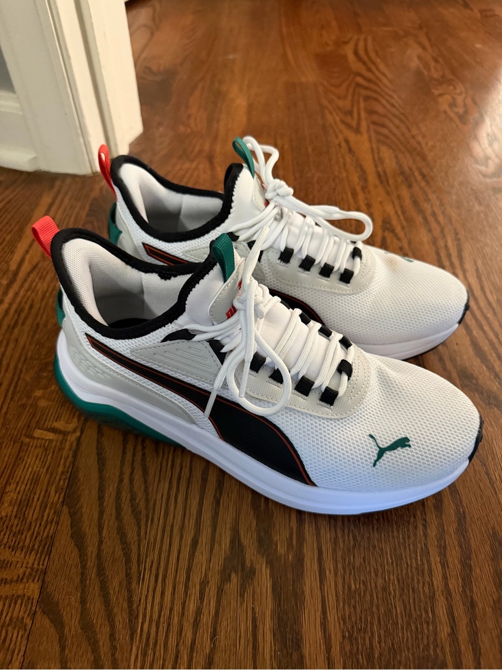 Puma Men’s White Sneakers with Black & Teal Accents